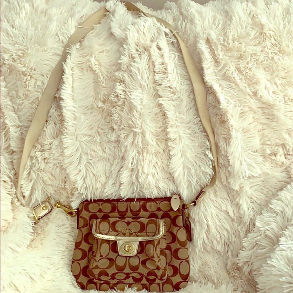 Crossbody canvas Coach bag.